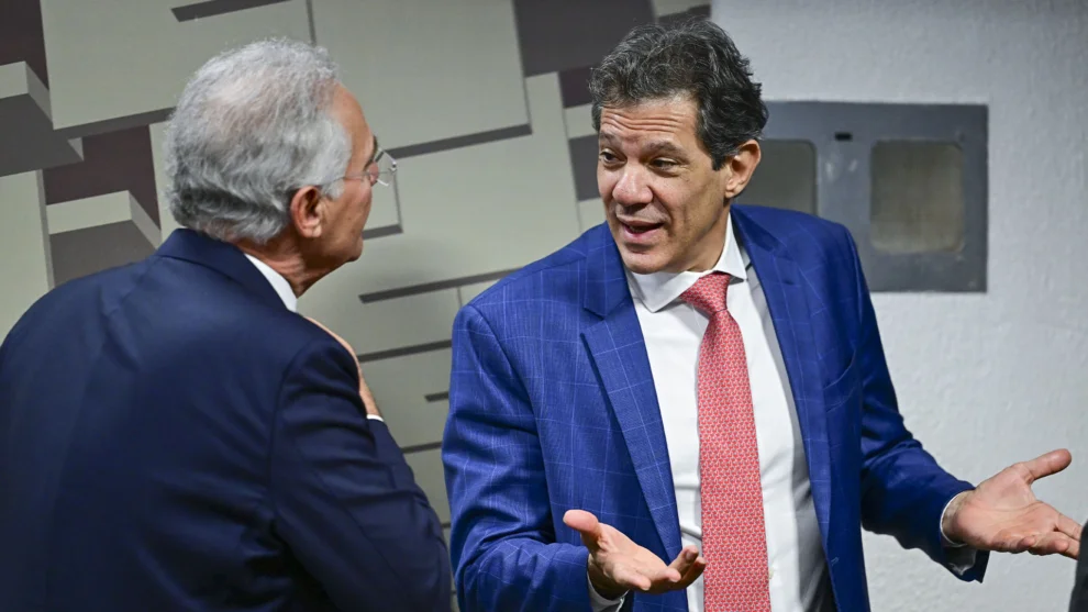 O ministro de Estado da Fazenda, Fernando Haddad e o senador Renan Calheiros.