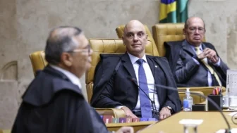 Os ministros Flávio Dino, Alexandre de Moraes e Gilmar Mendes